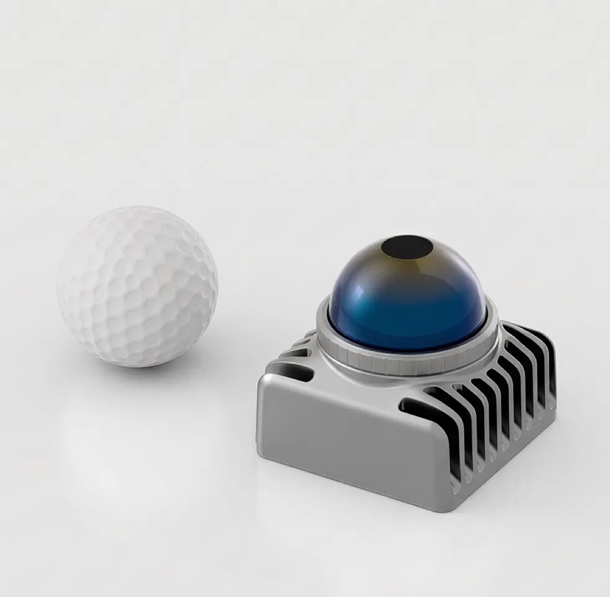 Mid-360S next to a golf ball for size comparison